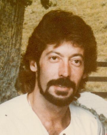Mark E Mellick